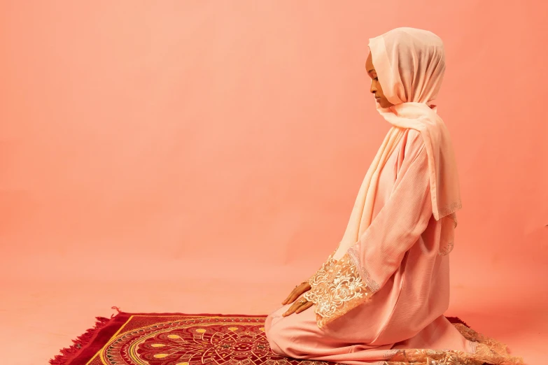 a woman is standing in front of an area rug