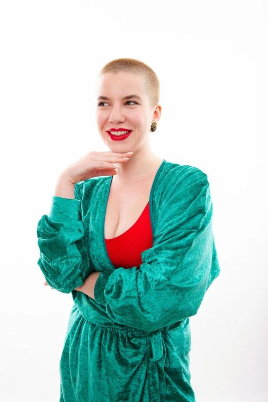 a woman with a red top posing for a picture