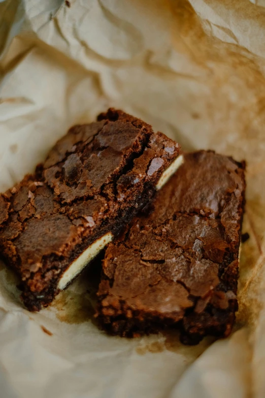 some brownies are cut into squares on a table