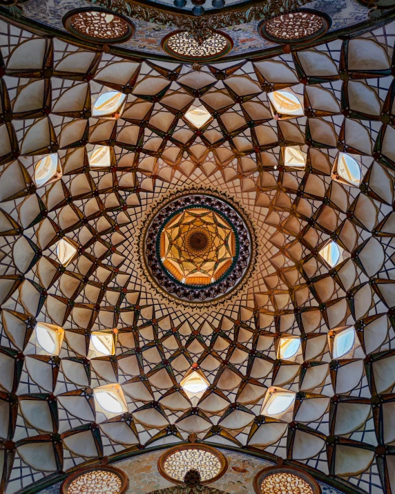 looking up at the ceiling of an ornate room