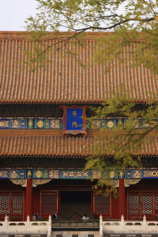 a large oriental building that is decorated in asian style