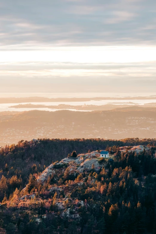 the view over the city is of a town nestled on a mountain side