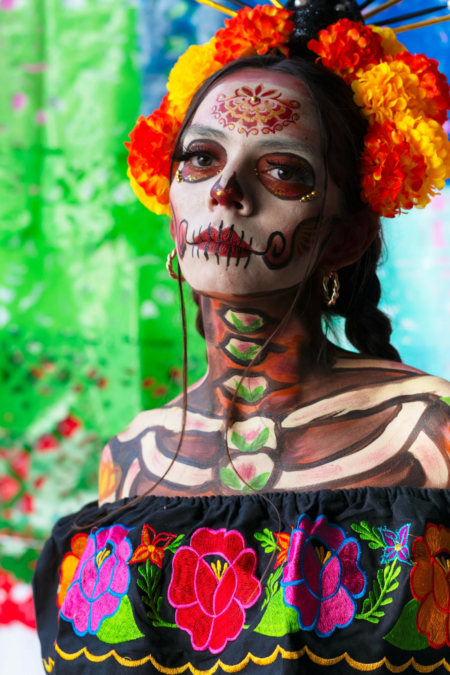 a woman with makeup and flower decorations, painted in day of the dead style