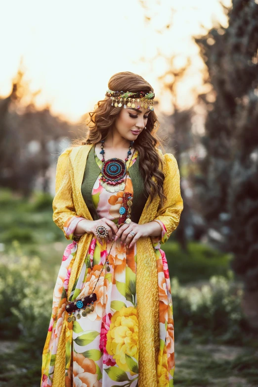 the girl is dressed in a colorful dress and accessories