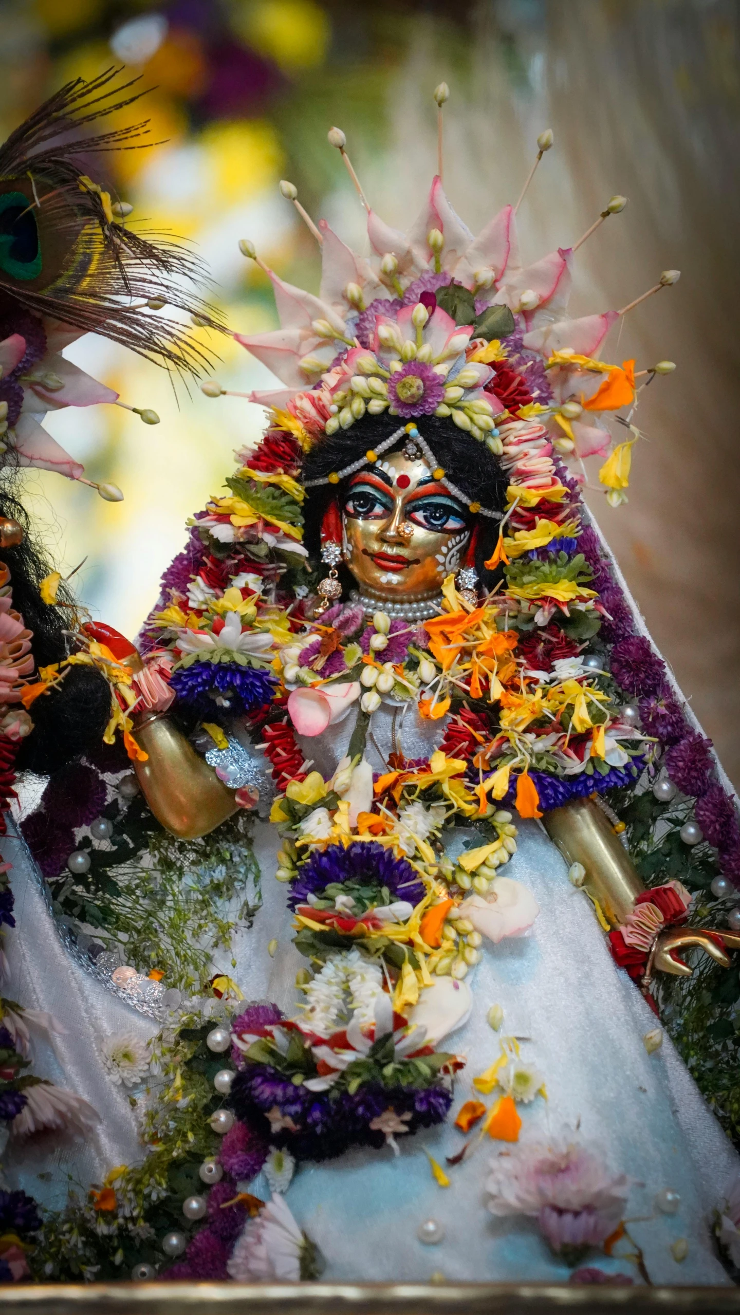 a man with a long face and body full of flowers