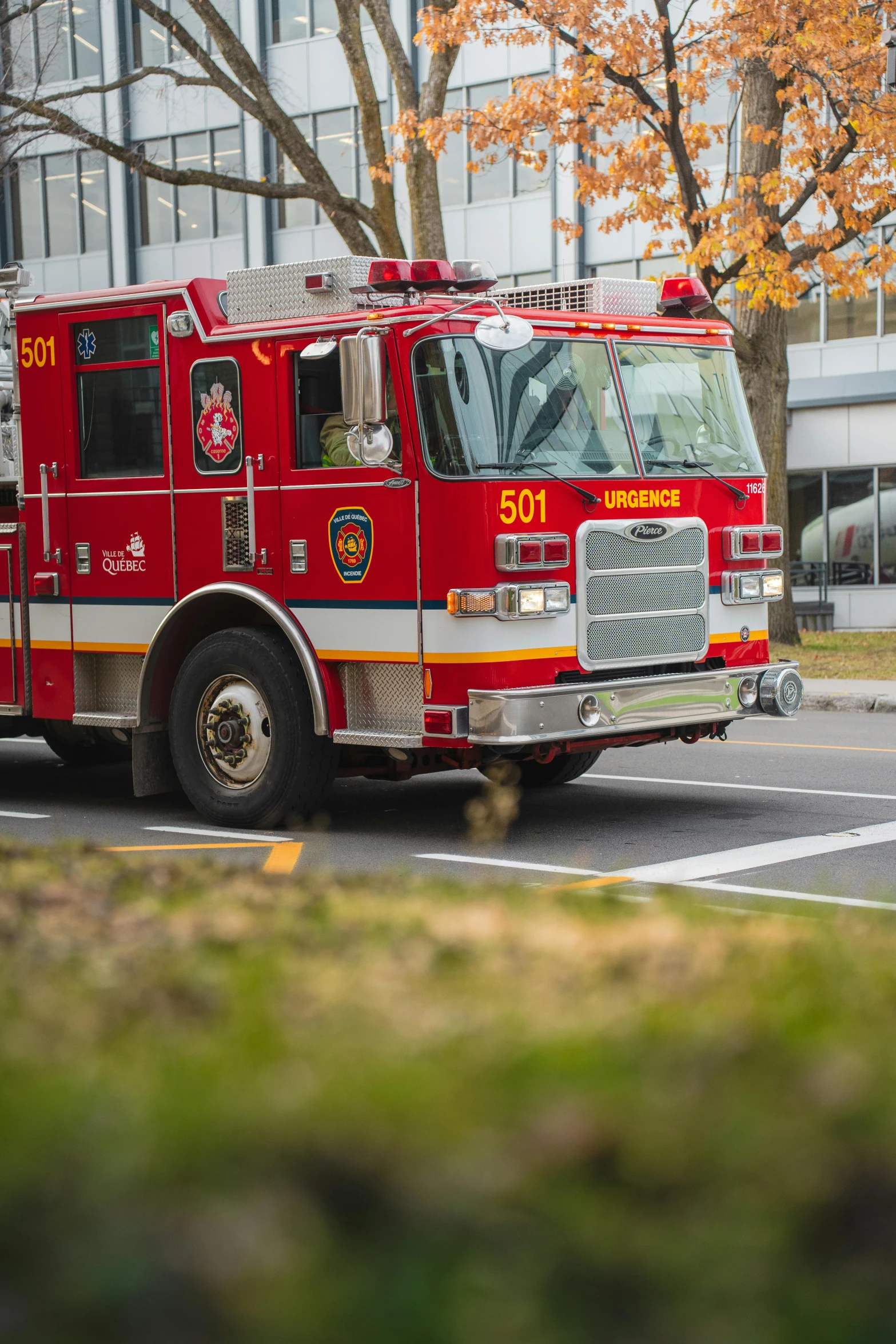 an engine with ladders on the street