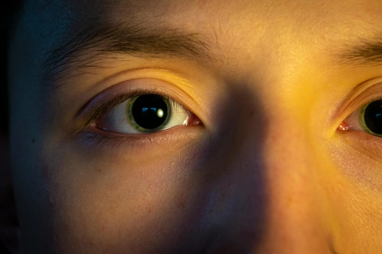 a person with brown eyes and white hair