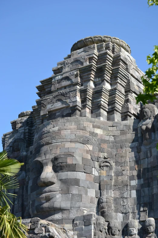 a head on a building made of bricks