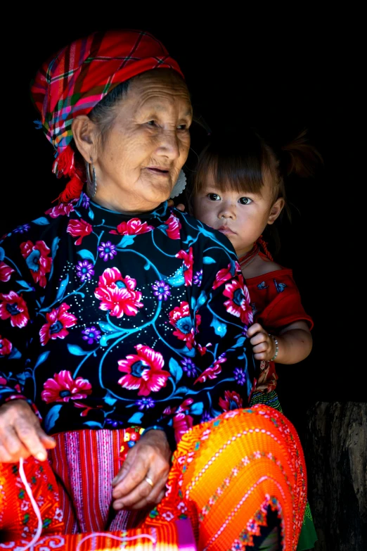 the woman and child are all dressed up for their picture session