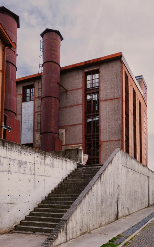 there is a building that is next to some stairs