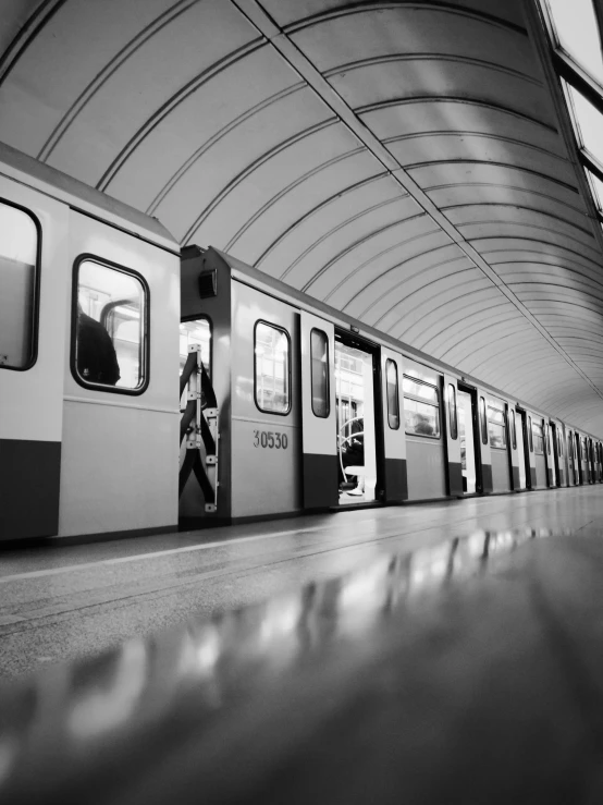 a train sitting inside of a train station