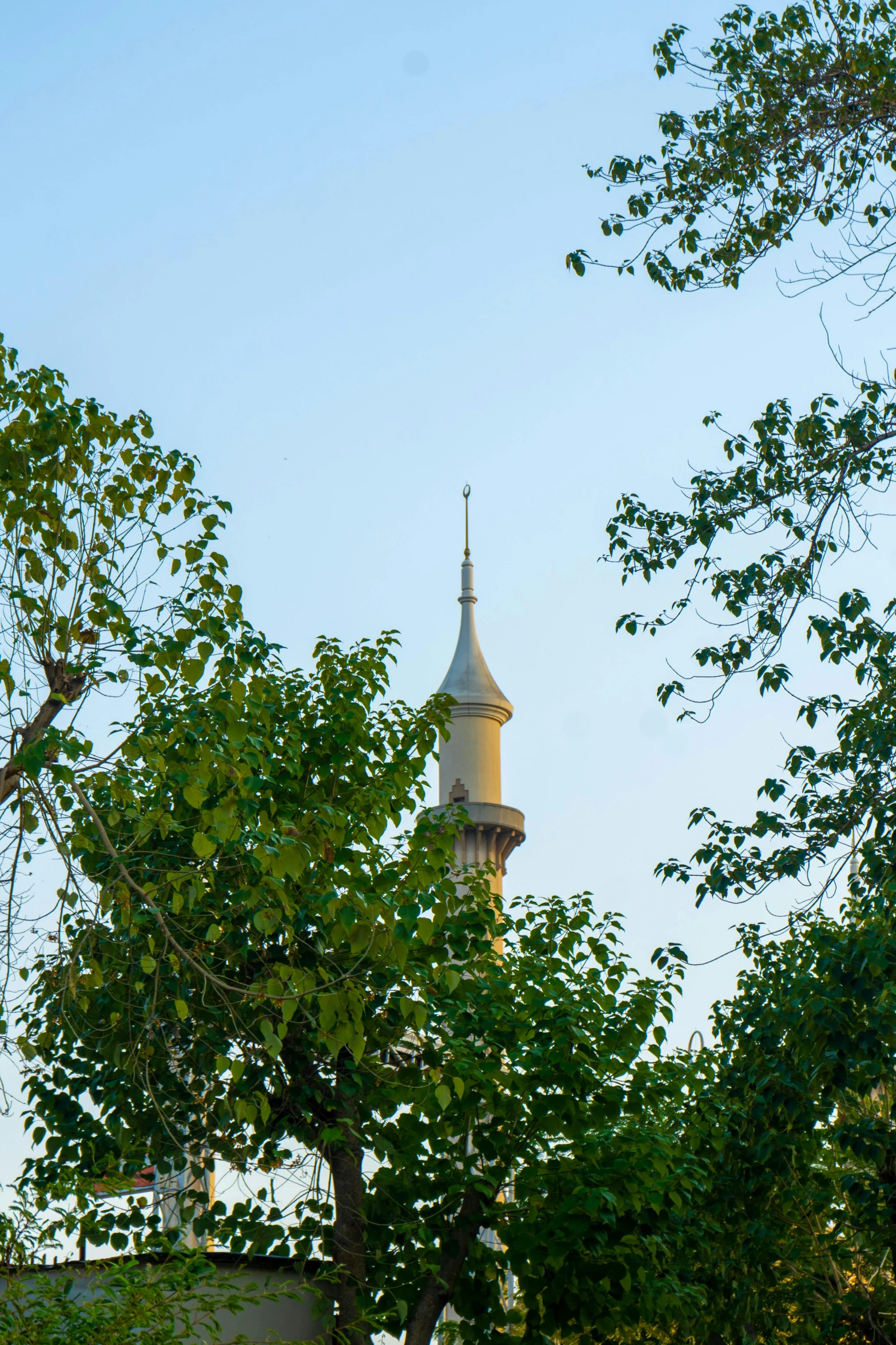 a view of a clock on the top of a tower