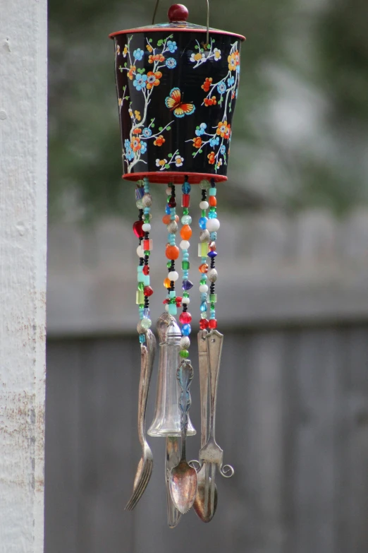 a close up view of a colorful wind chime