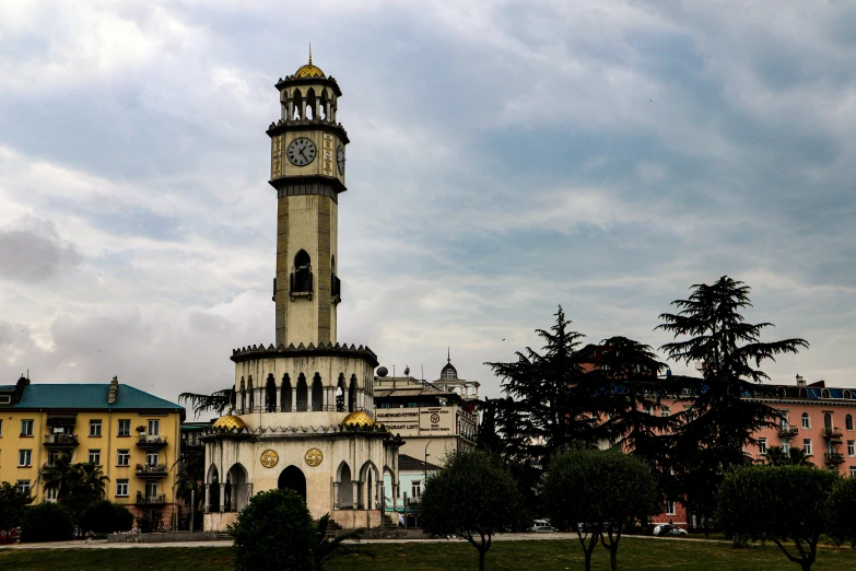 the tower stands tall with a clock on top