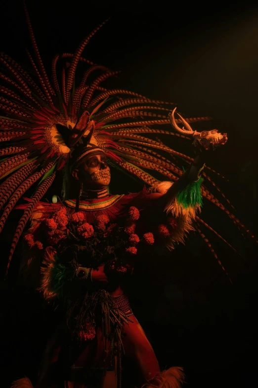 an asian dancer in a black background with fireworks