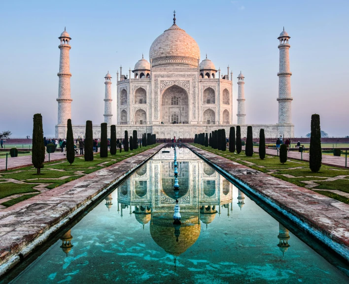 a long s of the tajjarm and its reflection in the water