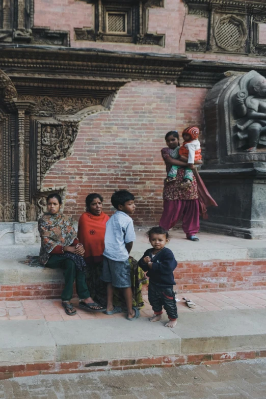 group of s standing on set of stairs