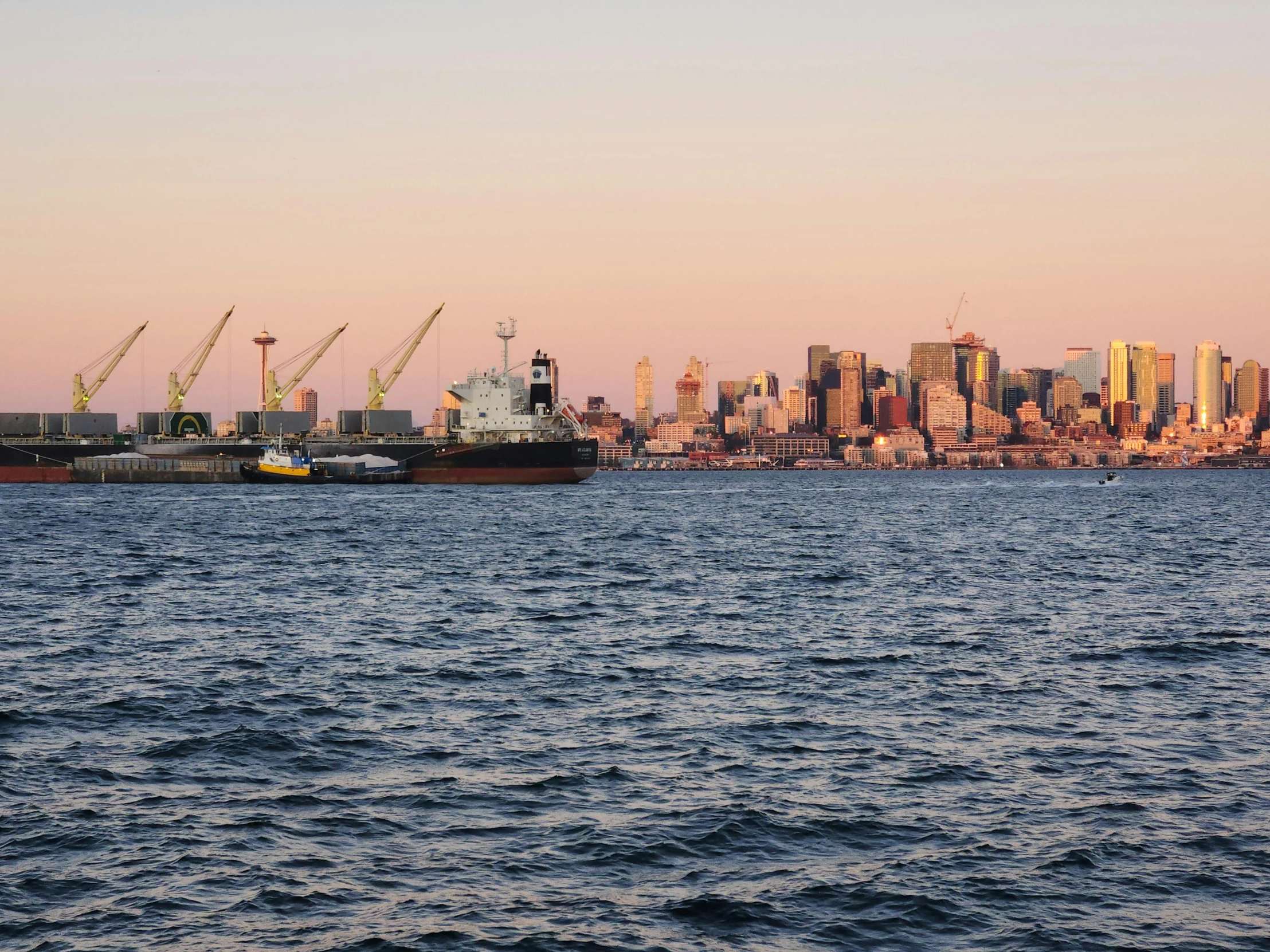 a very large ship floating in the middle of a large body of water