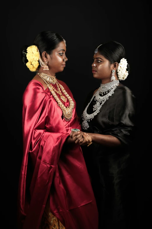 a close up of two women in costume