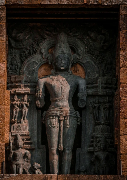 a stone statue is shown behind a doorway