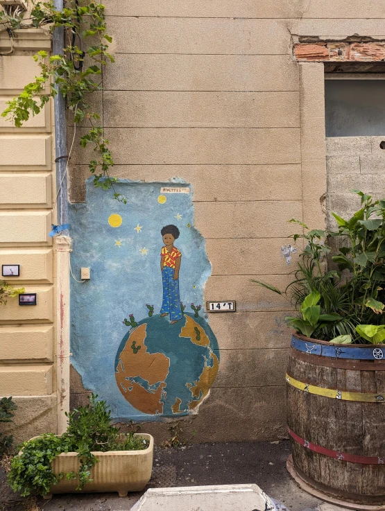 there is an image of a boy with a book on the wall