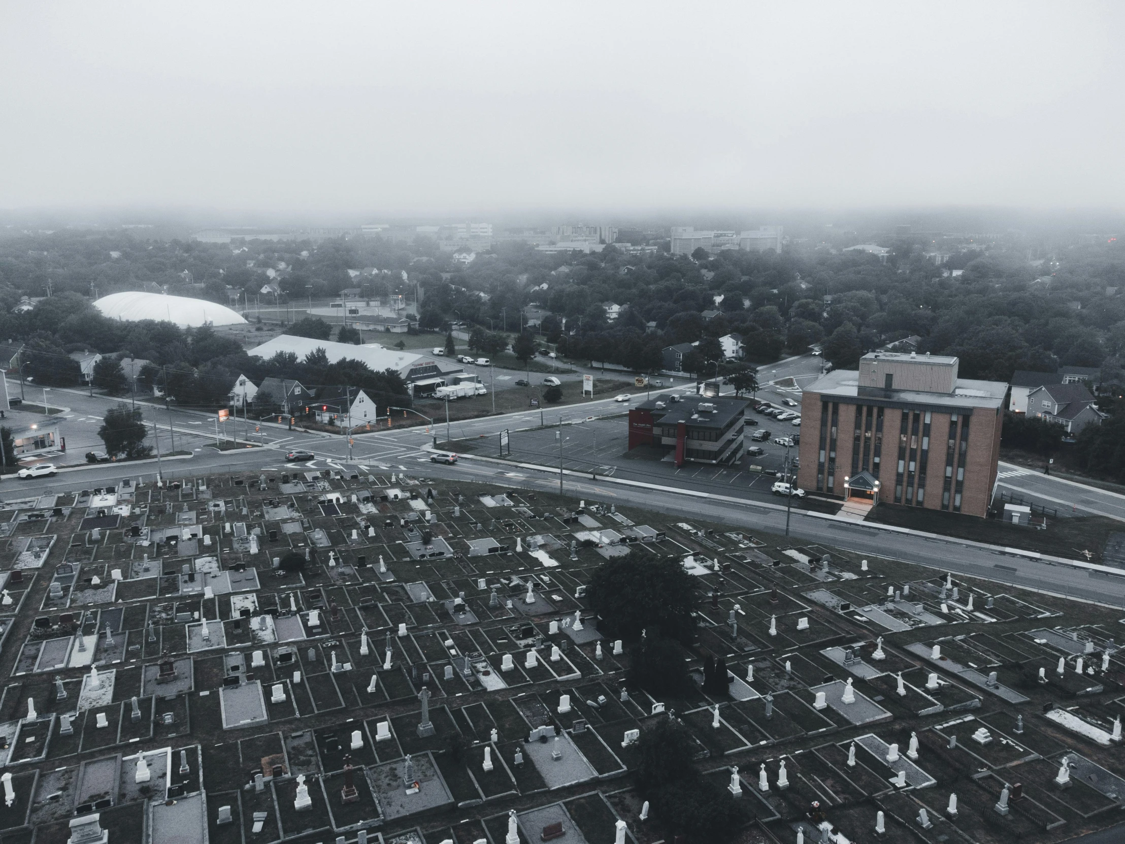 an aerial view shows graves of all sorts on the ground