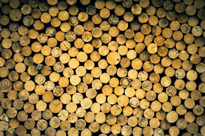 a pile of wood logs sitting on top of a table