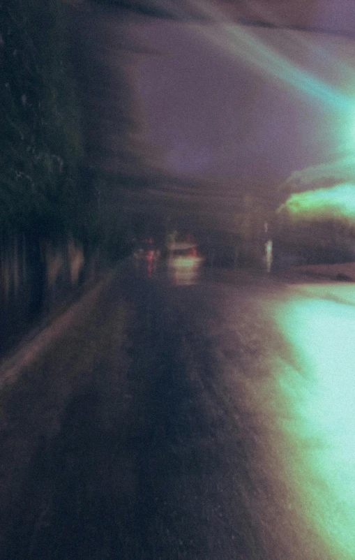 blurred pograph of car lights at night time