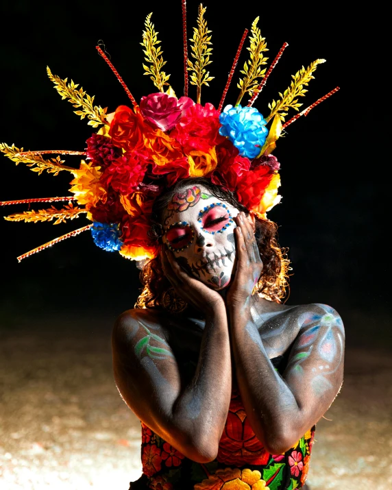 woman in head dress with flowers on it