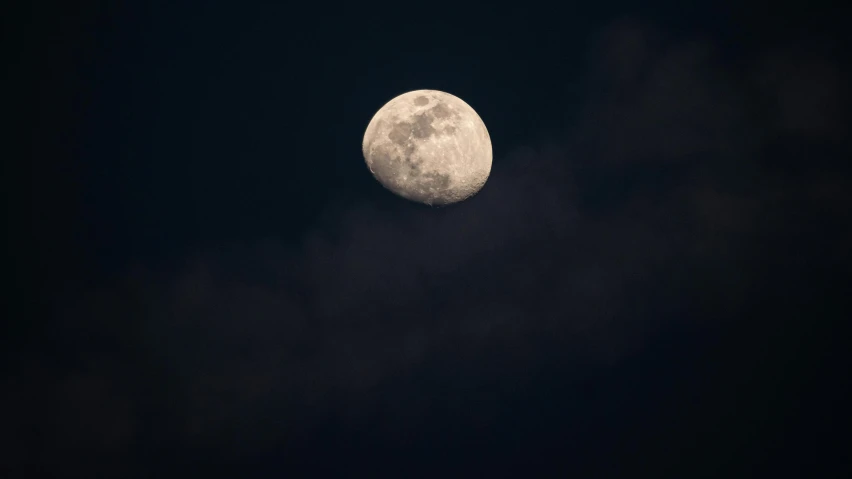 an image of a moon that is shining in the sky