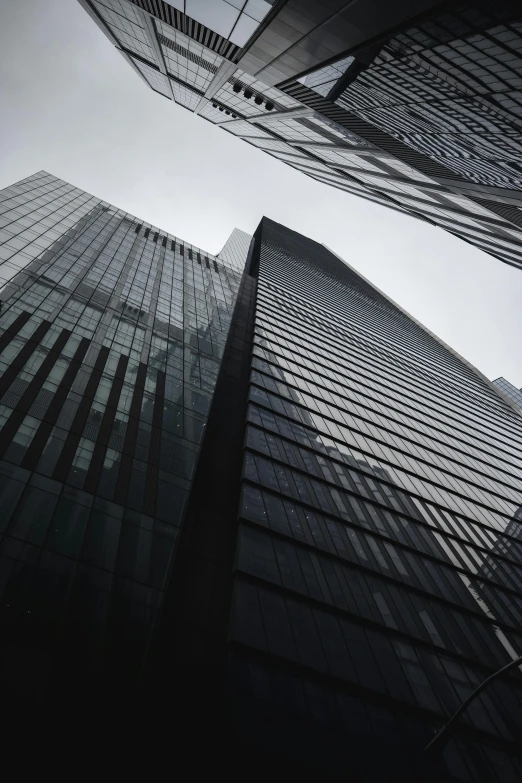 the view from outside an office building looking up