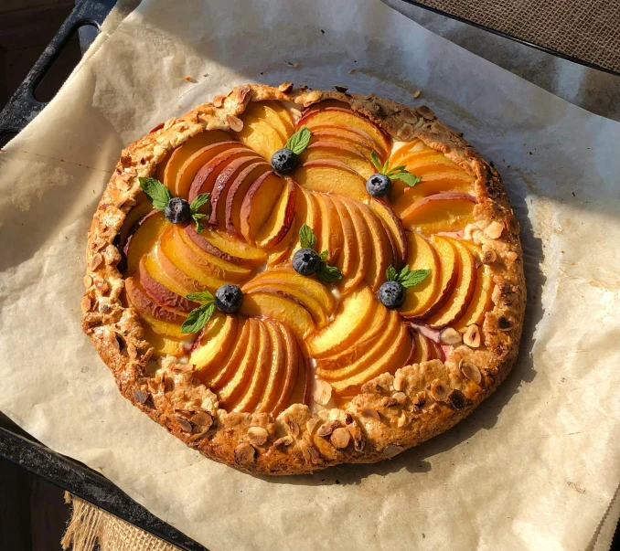 fruit tarte on wax paper in an iron pan