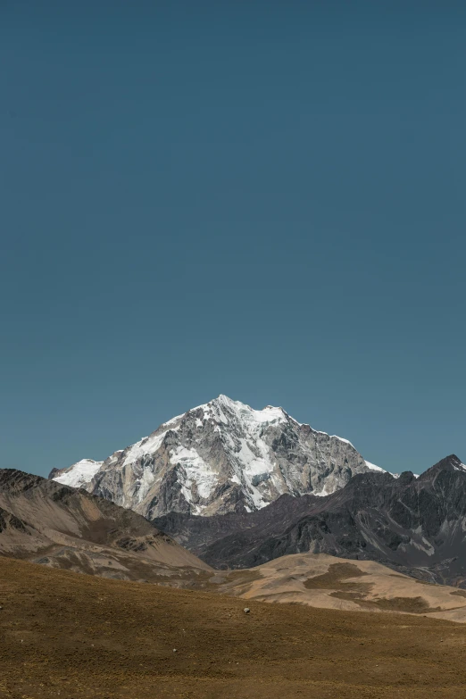 mountains and trees in the background with sky above them