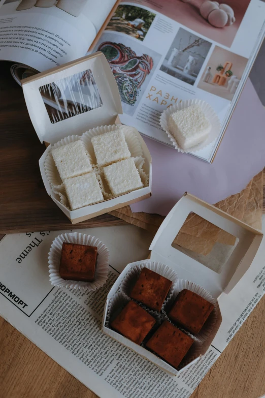 there is some desserts that are sitting on the table