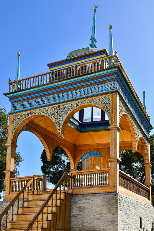 a large wooden structure on top of some steps