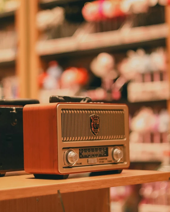 old radio sitting on a display in a store
