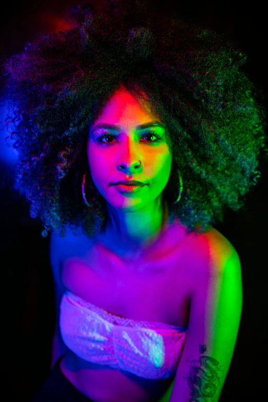 a woman with a neon  is in a colorful image