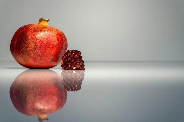 an apple is on a table near a fruit