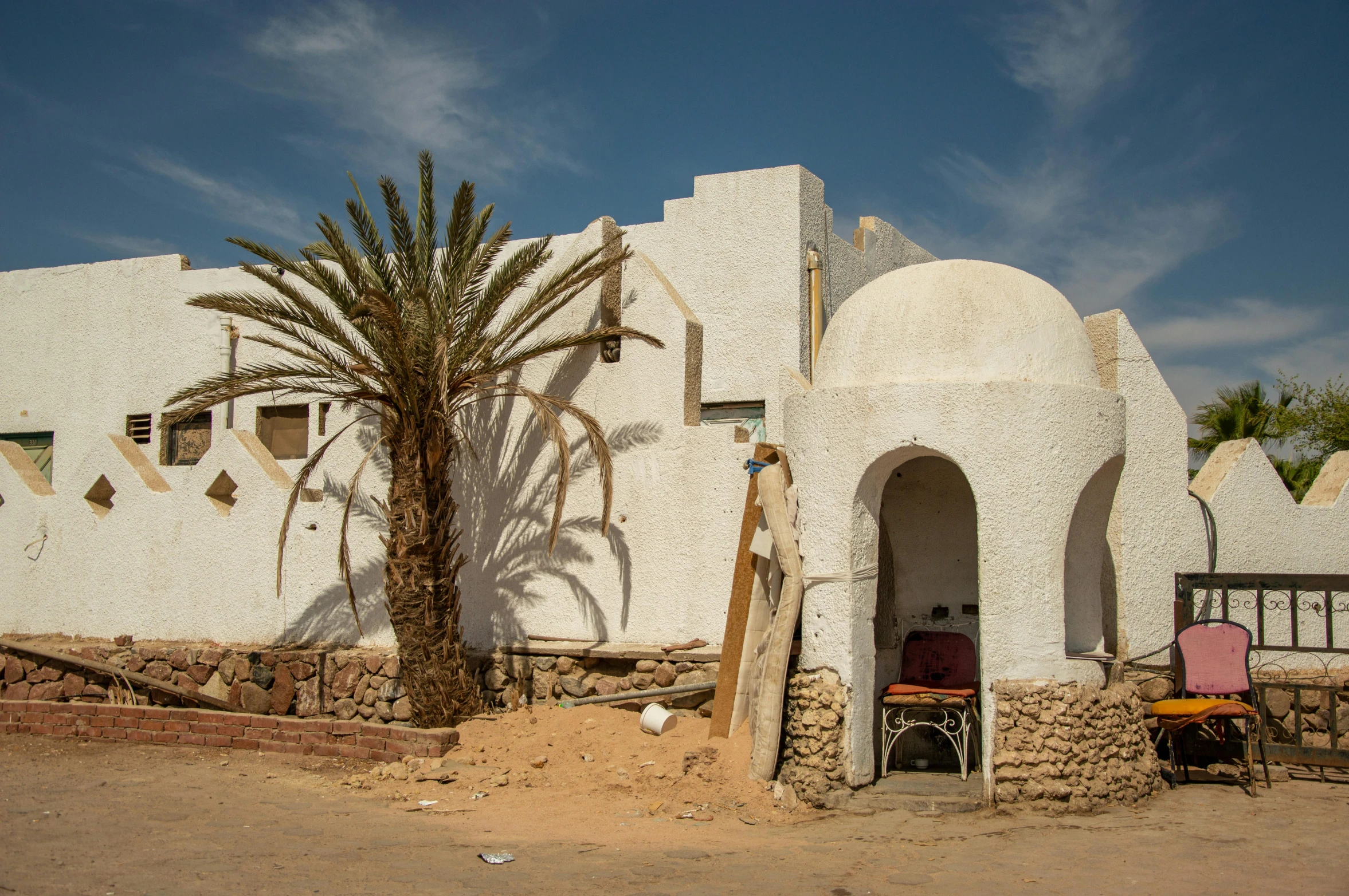 a home that is made up of stucco and wood