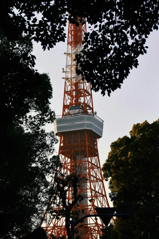 the top of a tall tower with a sky in the background