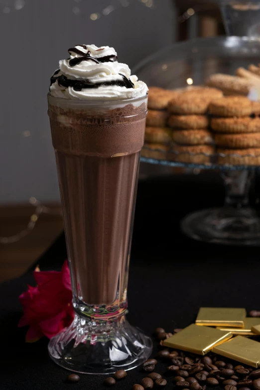 a cup of milkshake, cookies and cookies