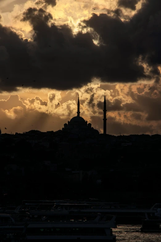 a cloudy skyline of an ancient city