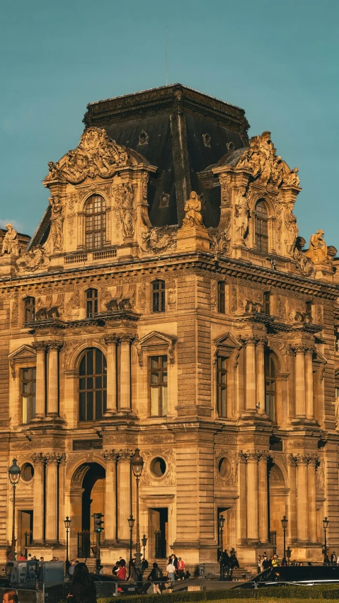 a large old style building on a sunny day