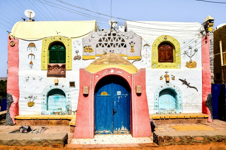 a large colorful building that is covered in art decoating