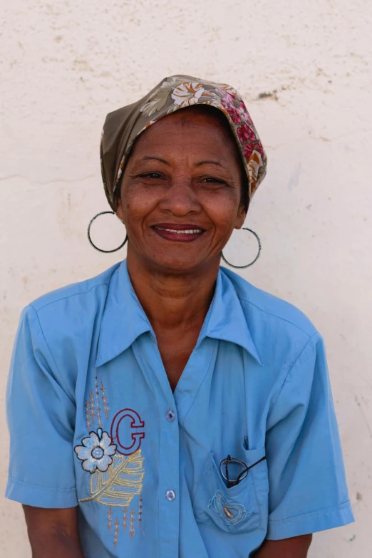 a woman that is standing up with a smile