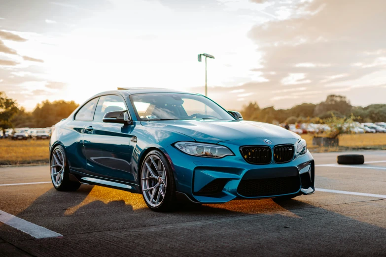 a bmw sports car parked in a parking lot