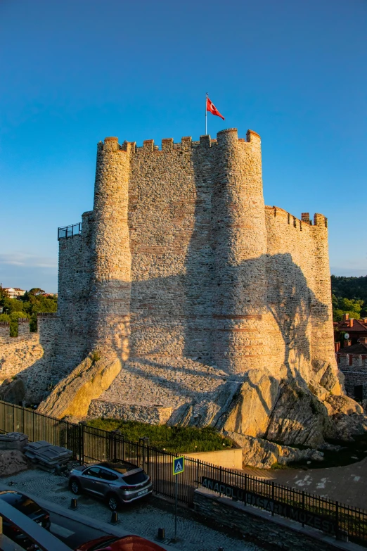 a castle that has the flag of france on top