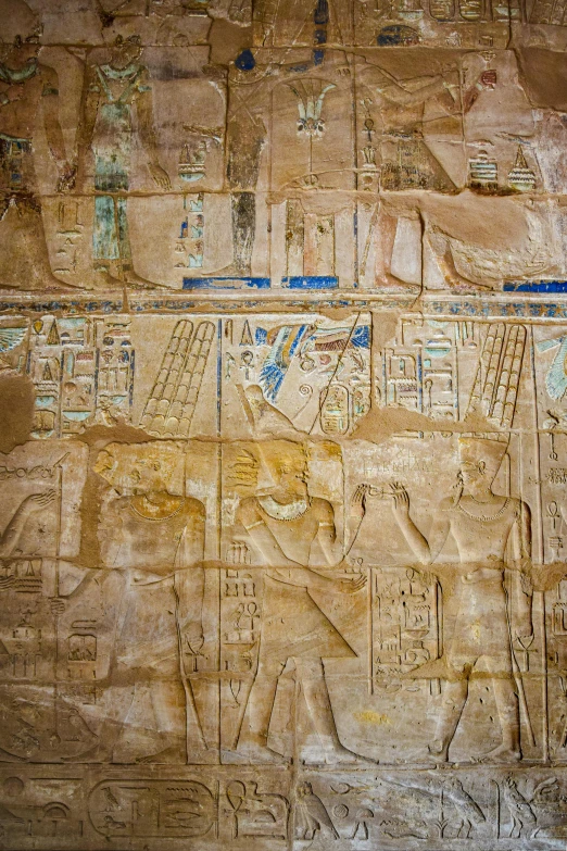 an egyptian scene with a picture of thebestrons and people