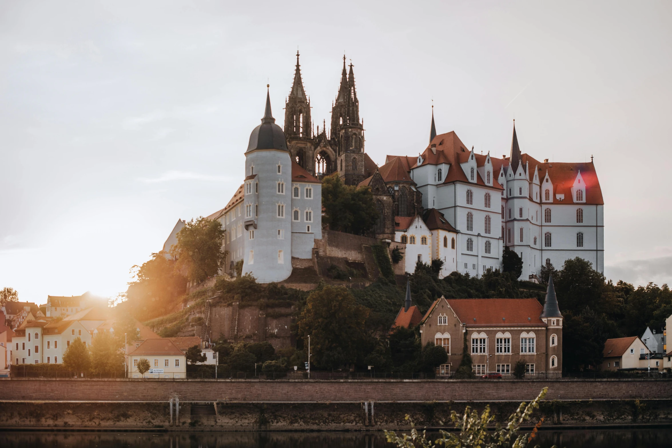 this is an old castle sitting on a hill overlooking the city