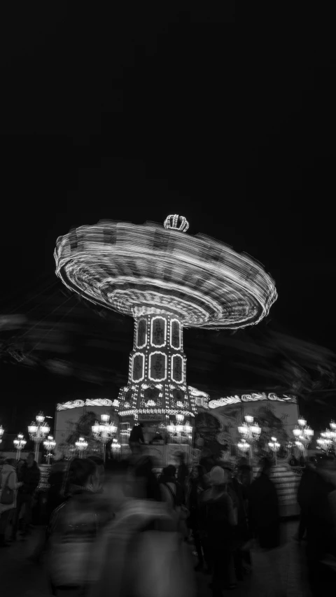 the carousel lights are lit up for the night